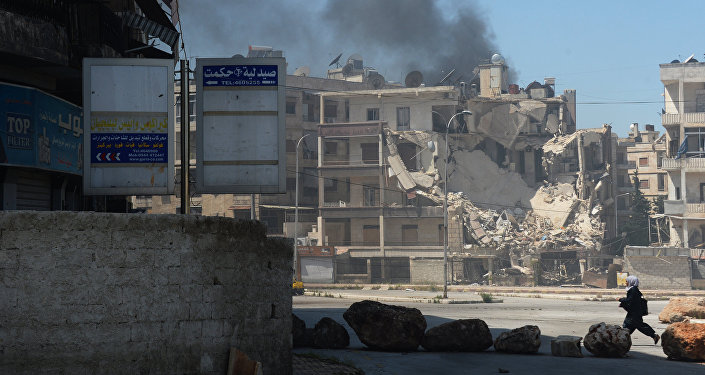 Militants shell a district in Aleppo