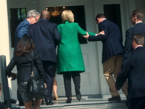hillary-gets-to-top-stairs