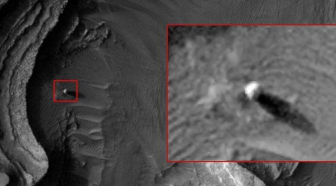Orbiter Photographs Spherical Object On The Martian Surface